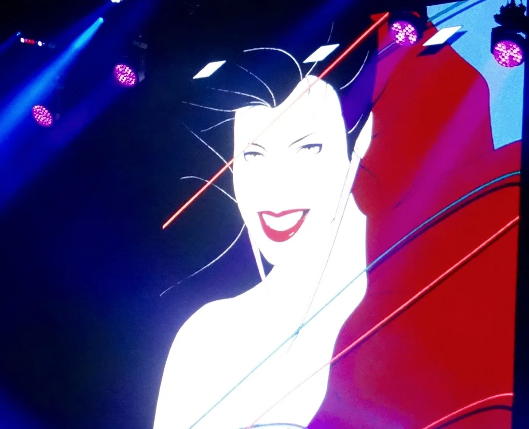 Duran Duran на концерте в Борнмуте, 2015, на фоне обложки Rio