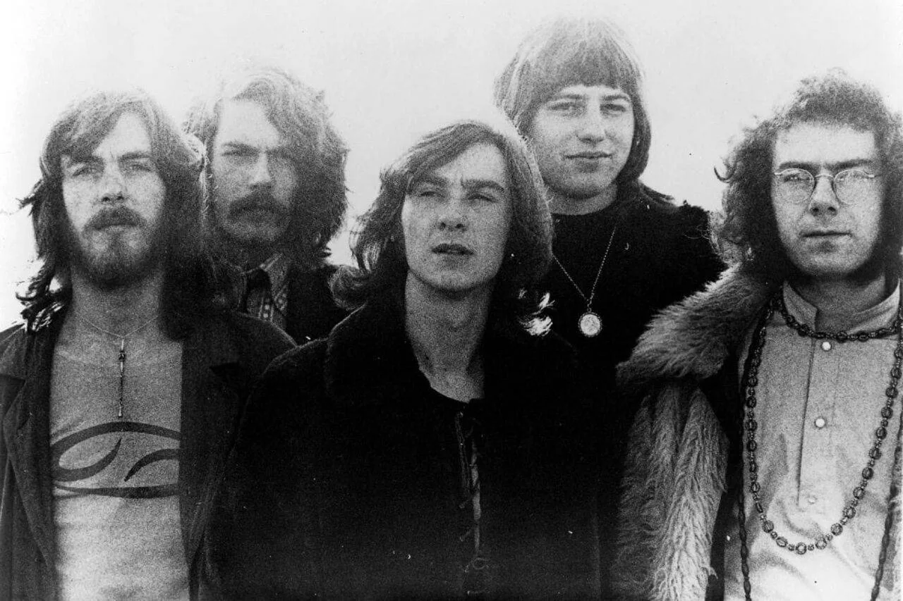 King Crimson в пресс-фото 1974 года: Джон Веттон, Дэвид Кросс, Роберт Фрипп, Билл Бруфорд