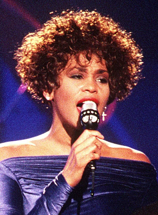 Whitney Houston поёт на сцене, 1991